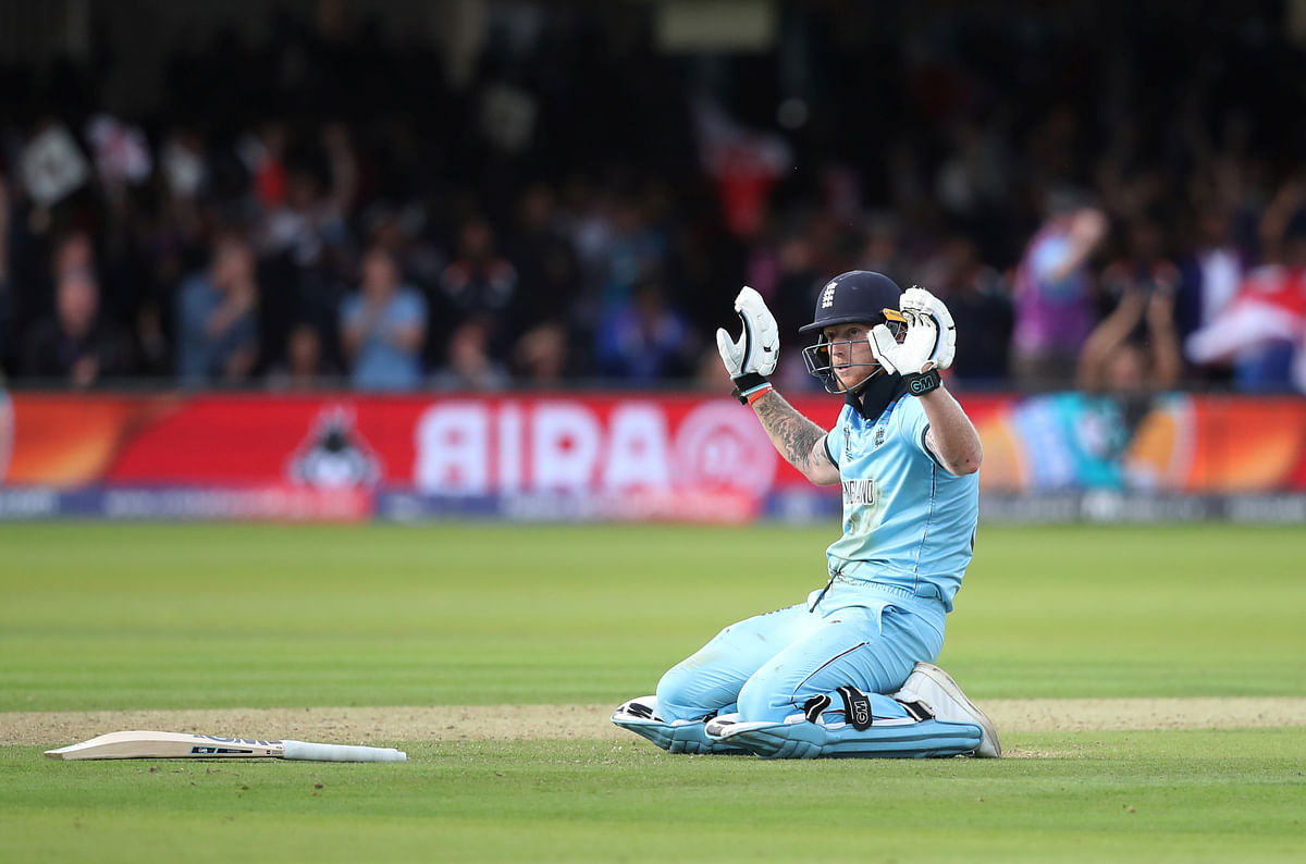 England`s Ben Stokes apologises to New Zealand captain Kane Williamson immediately after the ball deflects off his bat in the last over of the ICC Cricket World Cup Final at Lord`s, London, Britain on 14 July 2019. Photo: Reuters
