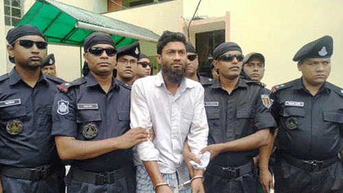 Sajjad Hossain Khan, 40, the main accused for killing madrasa student Dipti Akhter arrested. He has been arrested from Purba Khagdi of Sadar upazila at 5:00am and produced before the RAB-8 camp in Madaripur on Saturday. Photo: Aujoy Kundu