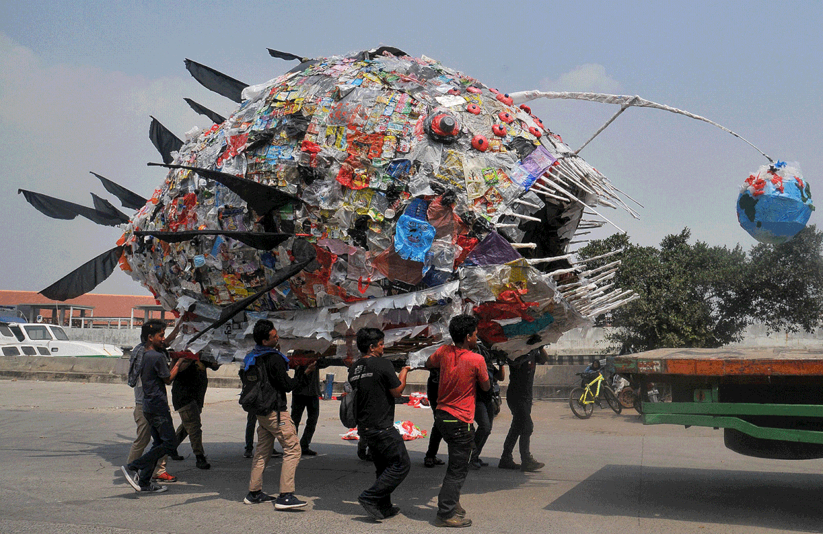 An installation depicting an anglerfish, made from plastic waste, is displayed by environmental activists during a rally in Jakarta on 20 July, 2019. Photo: AFP