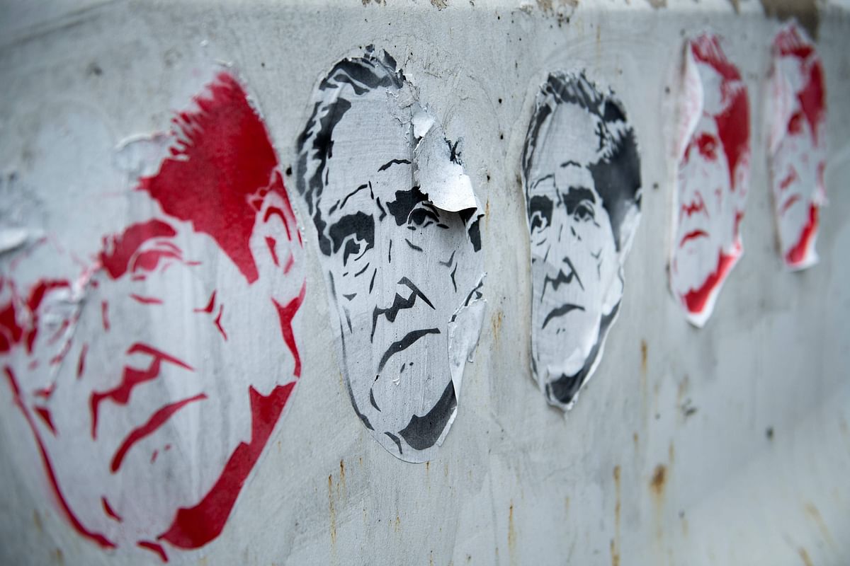 In this file photo taken on 11 July 2019 street art of former special council Robert Mueller is seen outside a construction site on 11 July 2019, in Washington, DC. Photo: AFP