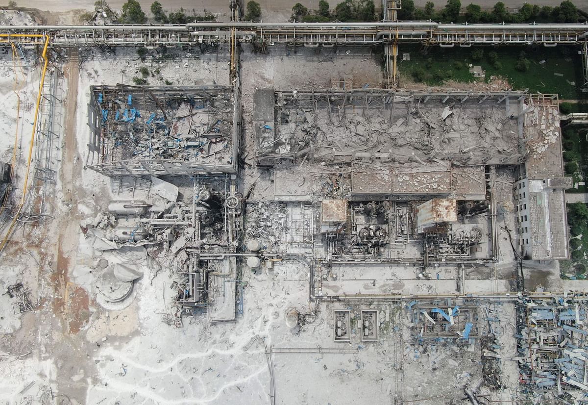 Damaged buildings are seen at the site of an explosion at the Henan Coal Gas Group factory in Yima city, in China`s central Henan province on 20 July 2019. Photo: AFP
