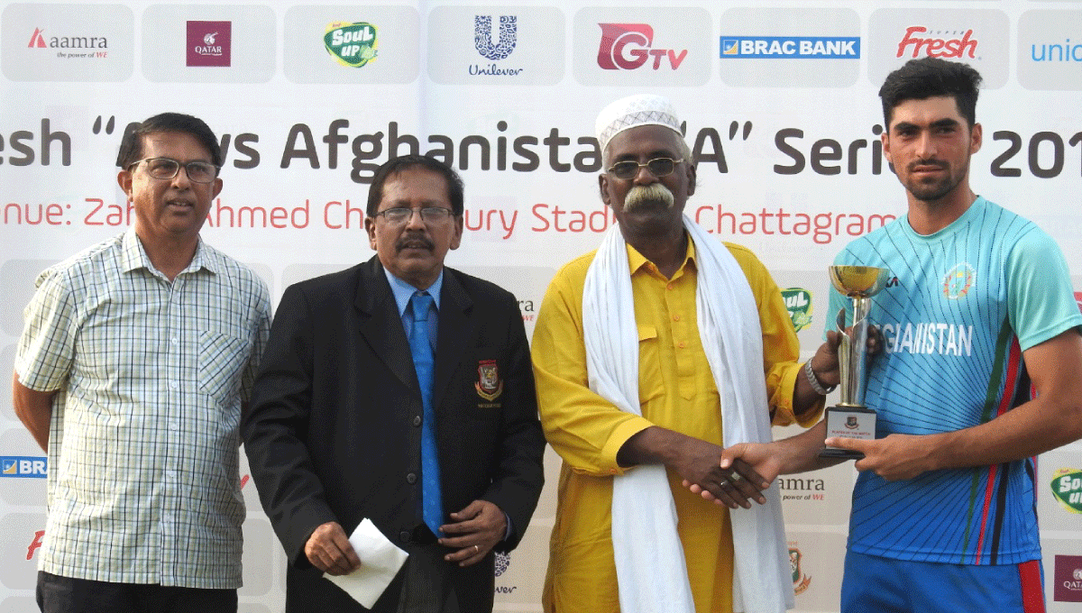 Ibrahim Zadran of Afghanistan-A receives man of the match. Photo: UNB