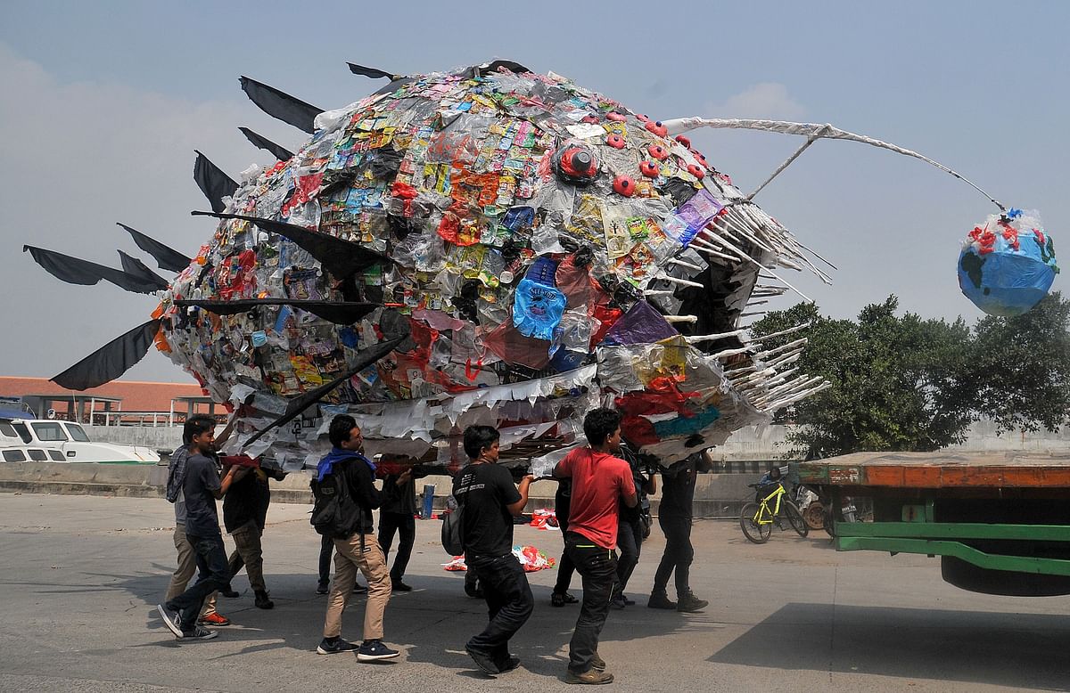 An installation depicting an anglerfish, made from plastic waste, is displayed by environmental activists during a rally in Jakarta on 20 July 2019. Photo: AFP