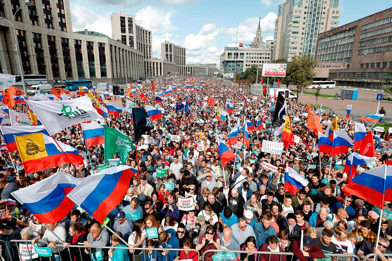 Demonstrators take part in a rally to support opposition and independent candidates after authorities refused to register them for September elections to the Moscow City Duma, Moscow, on 20 July 2019. Photo: AFP