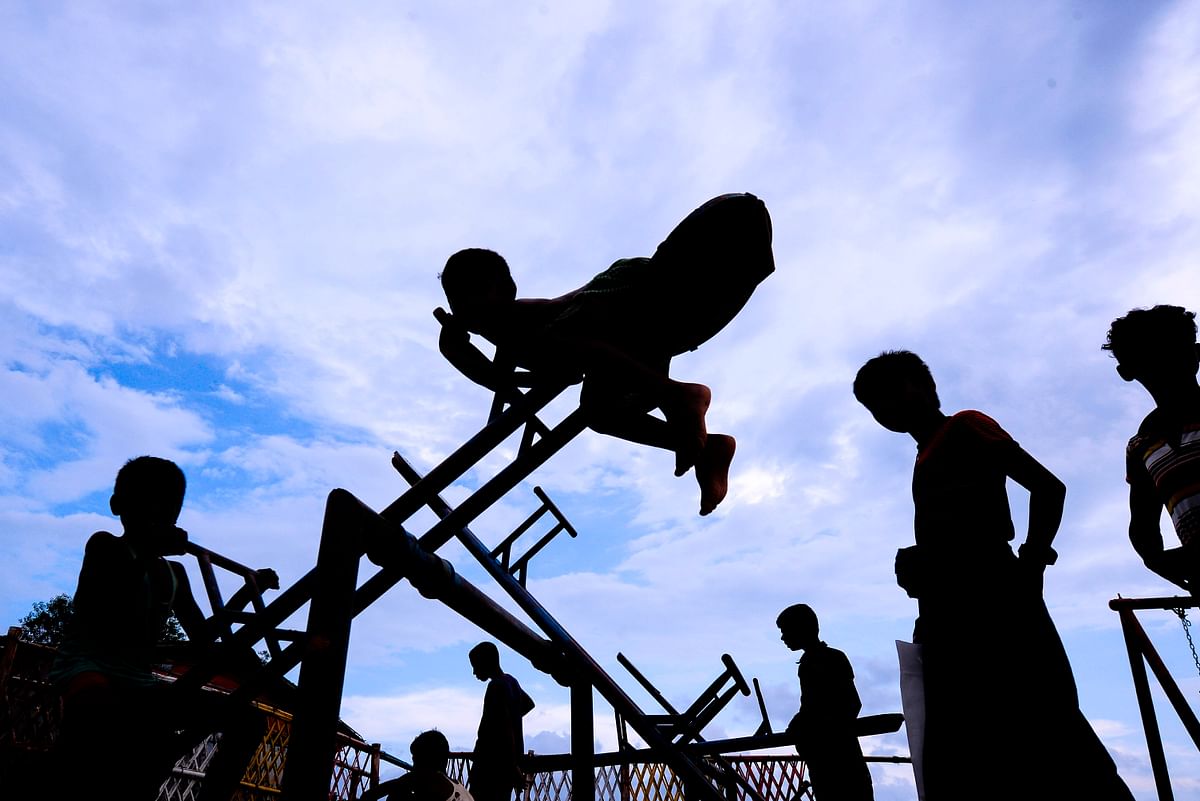 Rohingya children play at a playground at Kutupalong refugee camp in Ukhia on 21 July, 2019. Photo: AFP