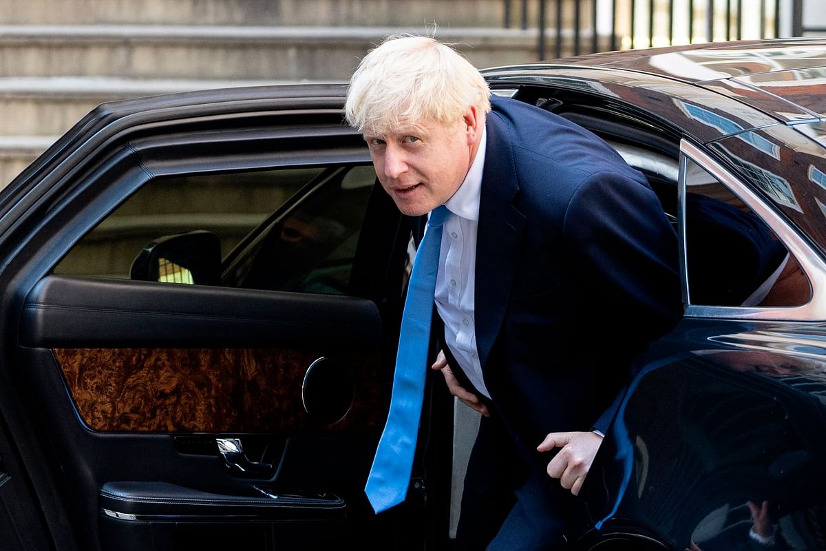 New Conservative Party leader and incoming prime minister Boris Johnson arrives at the Conservative party headquarters in central London on 23 July, 2019. Boris Johnson won the race to become Britain`s next prime minister on Tuesday, heading straight into a confrontation over Brexit with Brussels and parliament, as well as a tense diplomatic standoff with Iran. Photo: AFP