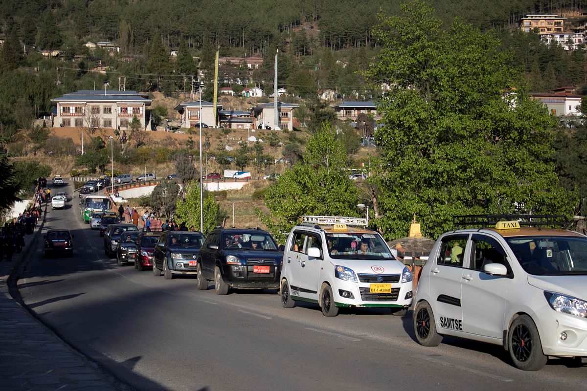 This photo taken on April 19, 2019 shows traffic backed up on a road in Bhutan`s capital Thimphu. Famed for valuing Gross National Happiness over economic growth, Bhutan was a poster child for sustainable development, but a boom in car sales may jeopardise its rare status as a carbon negative country. Photo: AFP