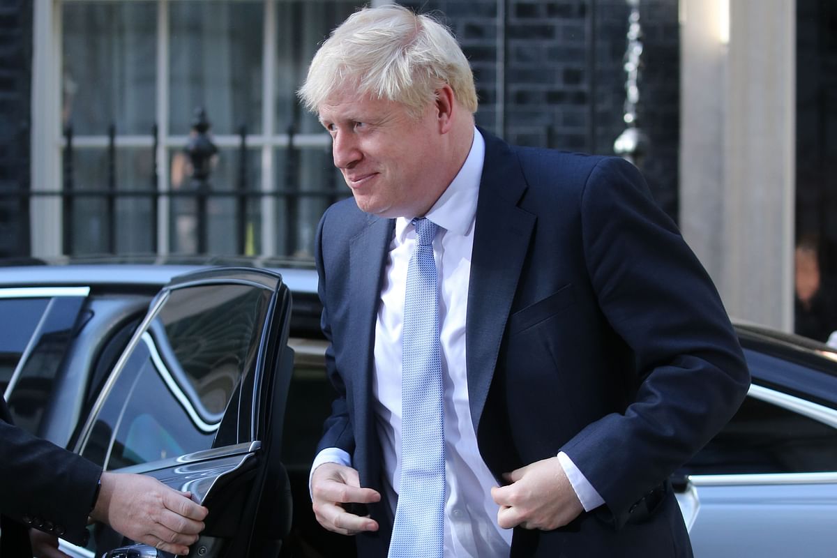 Britain`s new Prime Minister Boris Johnson arrives back at 10 Downing Street in London on 24 July 2019. Boris Johnson took charge as Britain`s prime minister on Wednesday, on a mission to deliver Brexit by 31 October with or without a deal. Photo: AFP