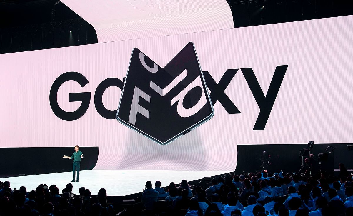 In this file photo taken on 20 February 2019, Samsung senior vice president of product marketing Justin Denison speaks on stage about the copany`s new foldable phone during the Samsung Unpacked product launch event in San Francisco, California. Photo: AFP