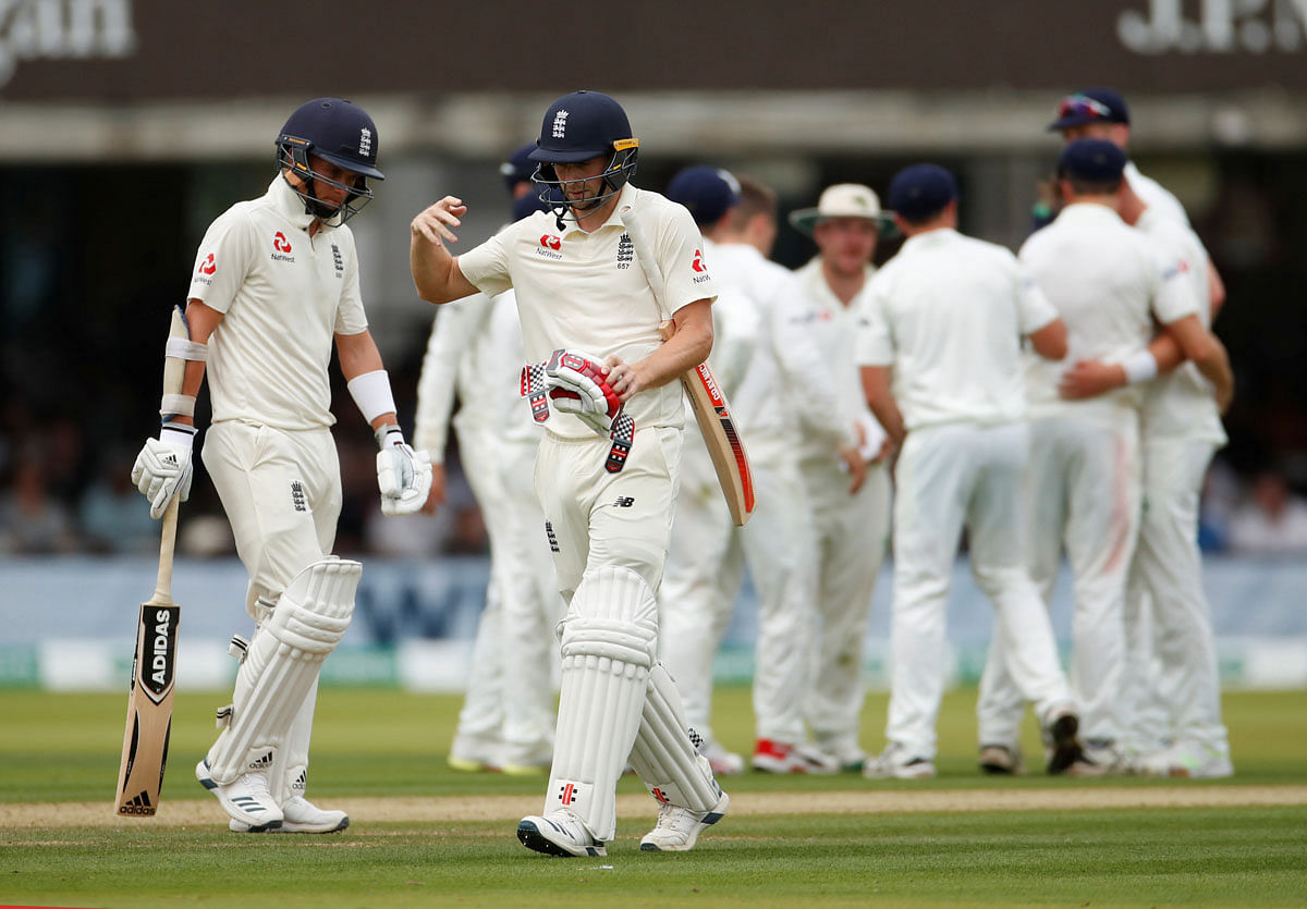England`s Chris Woakes leaves the field after being caught out by Ireland`s Andy Balbirnie in the only Test Match between England and Ireland at Lord`s Cricket Ground, London, Britain on 25 July 2019. Photo: Reuters