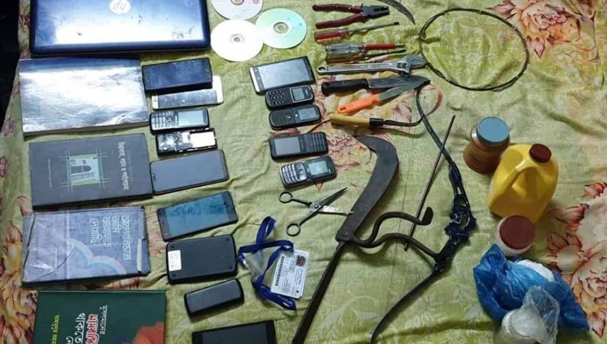 Police recover a few books, mobile phone sets and knives and other kitchen sharp-edged weapons from a house in Rupnagar residential area, Mirpur, Dhaka on Saturday. Photo: UNB