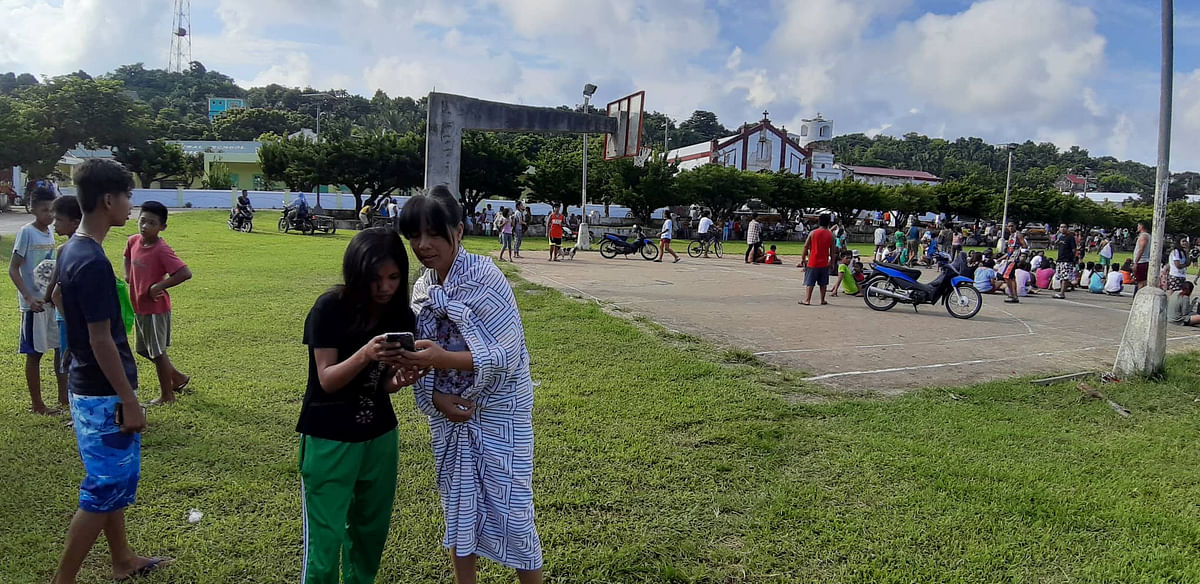 People gather on a field after an earthquake struck the Batanes Province, in northern Philippines, on 27 July 2019, in this photo obtained from social media. Photo: Reuters