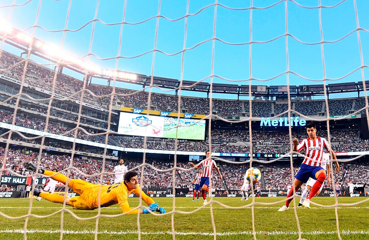 Atletico Madrid`s Diego Costa scores his first goal during the 2019 International Champions Cup football match between Real Madrid and Atletico Madrid at the Metlife Stadium Arena in East Rutherford, New Jersey on 26 July 2019. Photo: AFP