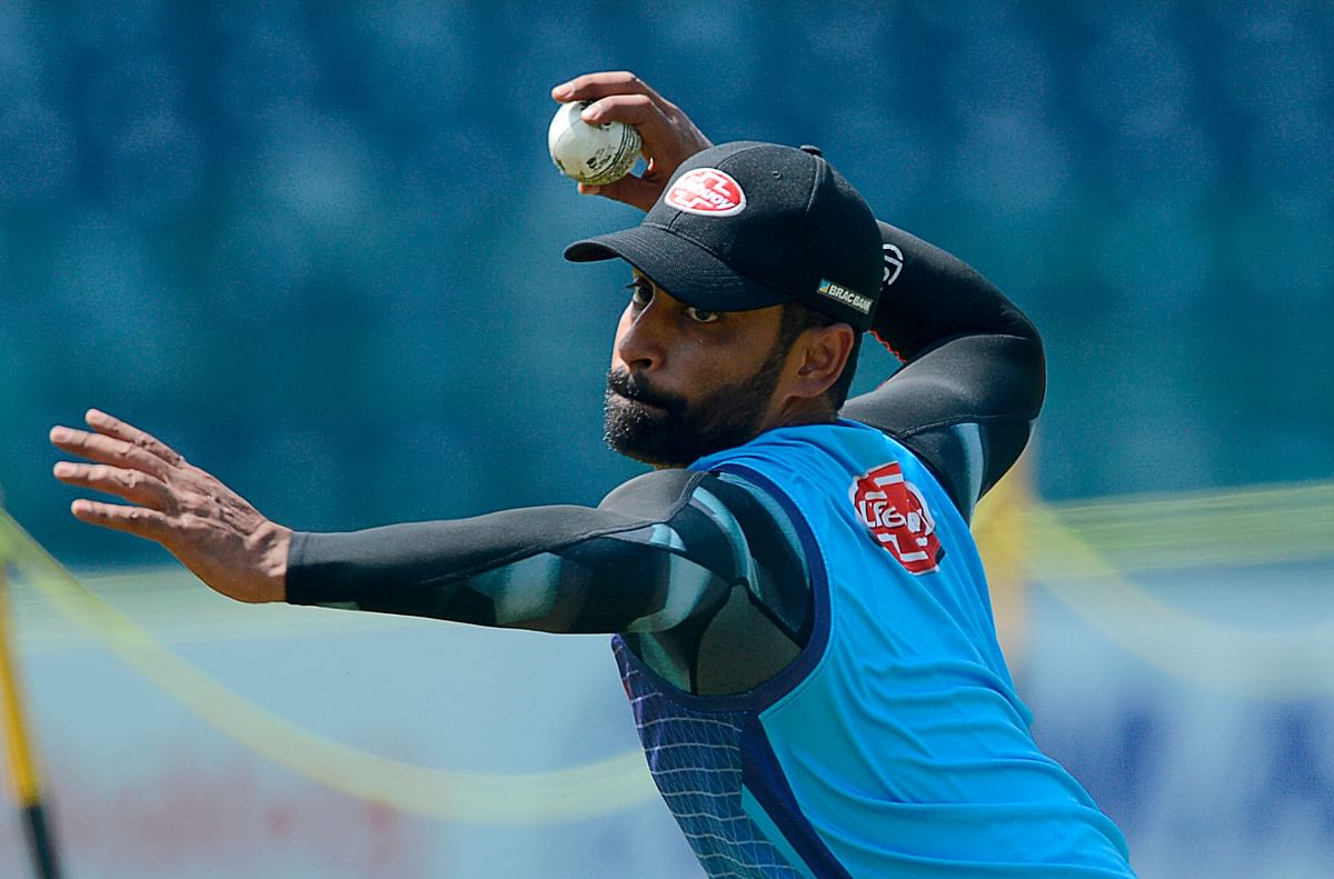 Bangladesh cricket captain Tamim Iqbal throws a ball during a practice session at R.Premadasa Stadium in Colombo on 30 July 2019. Photo: AFP