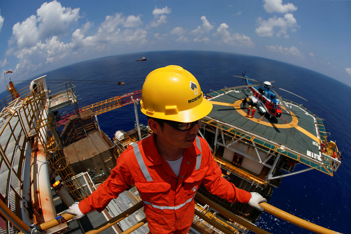 Rosneft Vietnam employee looks on at the Lan Tay gas platform in the South China Sea off the coast of Vung Tau. Photo: Reuters