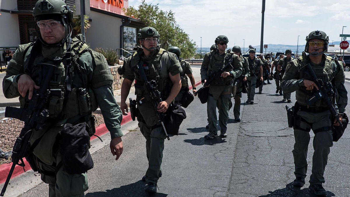 Law enforcement agents respond to an active shooter at a Wal-Mart near Cielo Vista Mall in El Paso, Texas, on 3 August 2019. Photo: AFP