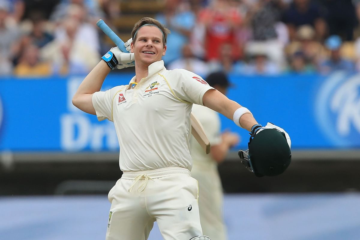 Australia`s Steve Smith celebrates reaching his century during play on the fourth day of the first Ashes cricket Test match between England and Australia at Edgbaston in Birmingham, central England on 4 August, 2019. Photo: AFP