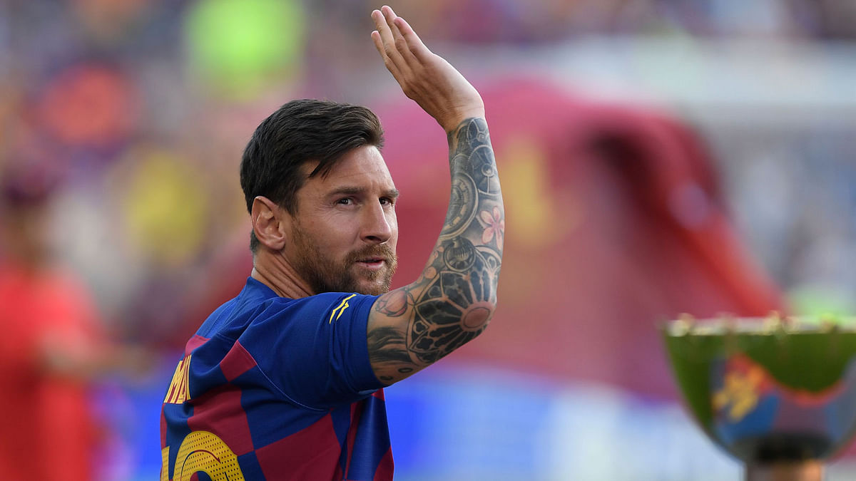 Barcelona’s Argentinian forward Lionel Messi waves before the 54th Joan Gamper Trophy friendly football match between Barcelona and Arsenal at the Camp Nou stadium in Barcelona on 4 August 2019. Photo: AFP