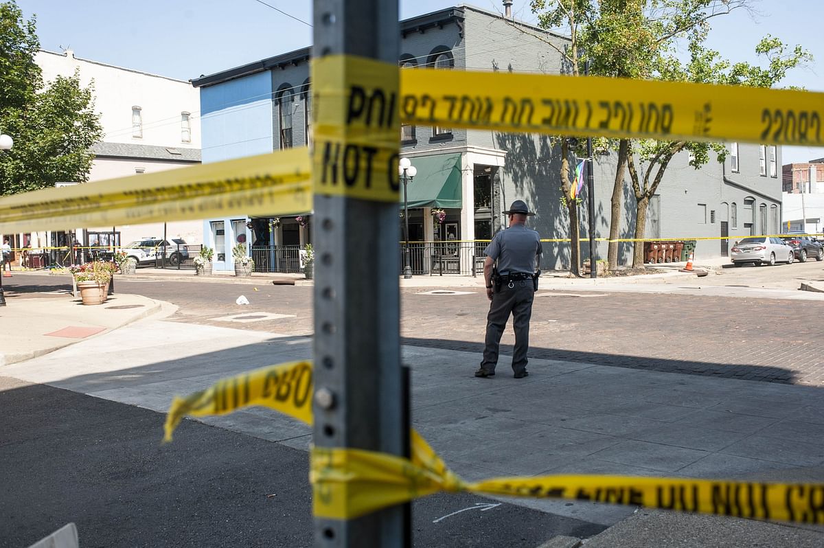 Law enforcement officials investigate the scene where a gunman opened fire on a crowd of people over night on Fifth Avenue in the Oregon District on August 4, 2019 in Dayton, Ohio. In the second mass shooting in the U.S. within 24 hours a gunman left nine dead and another 27 wounded after only a minute of shooting. Photo: AFP