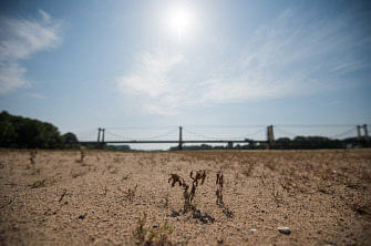 This file photo taken on 24 July 2019 shows a dry part of the bed of the River Loire at Montjean-sur-Loire, western France, as drought conditions prevail over much of western Europe. July 2019 was the warmest month across the globe ever recorded, according to data released on 5 August by the European Union’s satellite-based Earth observation network. Photo: AFP