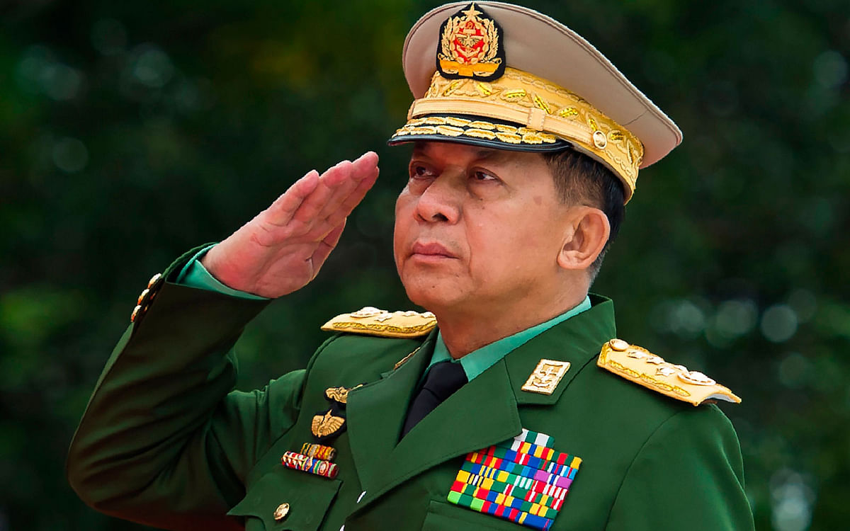 In this file photo taken on 19 July 2018, Myanmar’s Chief Senior General Min Aung Hlaing, commander-in-chief of the Myanmar armed forces, salutes to pay his respects to Myanmar independence hero General Aung San and eight others assassinated in 1947, during a ceremony to mark the 71th anniversary of Martyrs’ Day in Yangon. Photo: AFP