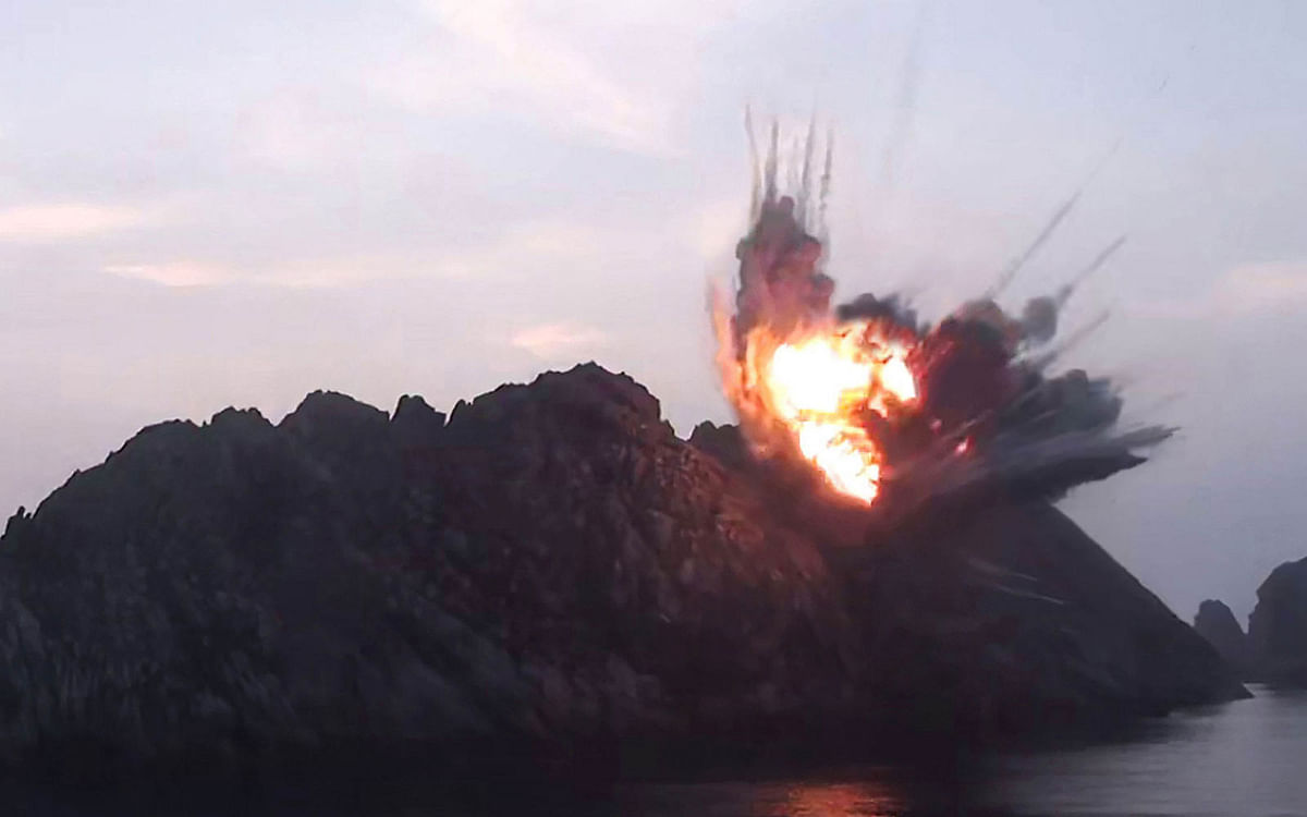 This early 6 Augus picture released from North Korea’s official Korean Central News Agency (KCNA) on 7 August shows a new type tactical guided missile hitting a targeted islet in the East Sea of Korea during its demonstration fire. Photo: AFP