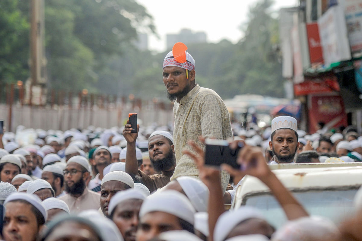 An activist of Islami Andolan Bangladesh, an Islamic political group, looks on as he gathers with others at the national press club for a rally to protest against recent situation on Kashmir in neighbouring India, in Dhaka on 6 August 2019. Photo: AFP