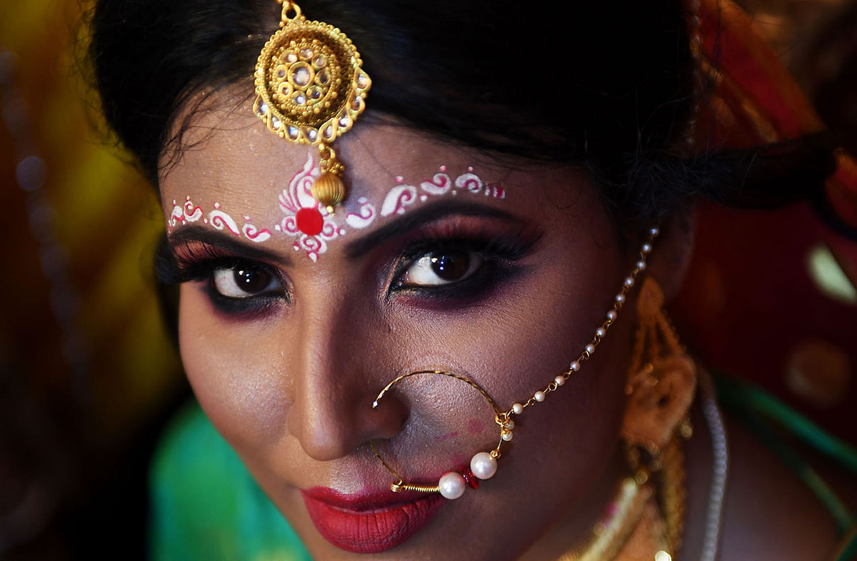 This photo taken on 5 August 2019 shows transgender woman Tista Das, 38, posing for a photograph before her wedding to a transgender man in Kolkata. Photo: AFP
