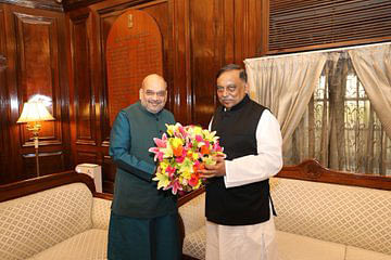 India`s home minister Amit Shah greets Bangladesh`s home minister Asaduzzaman Khan in New delhi. Photo: Twitter