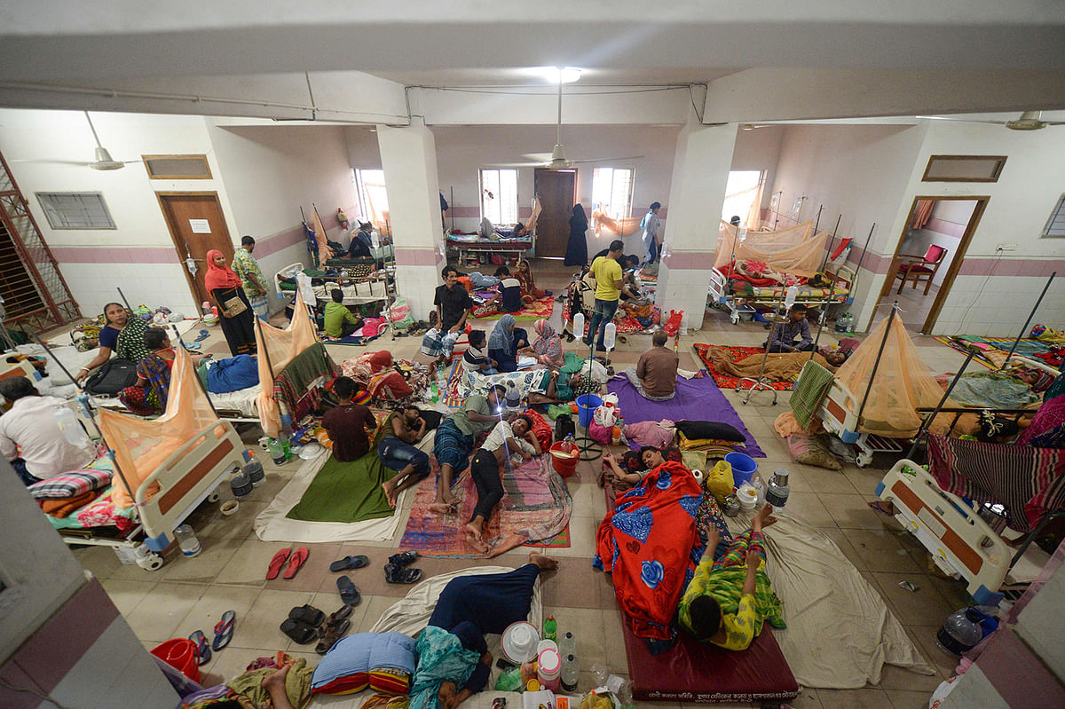 Bangladeshi patients suffering from dengue fever rest at a ward at the Mugda Medical College and Hospital in Dhaka on 8 August, 2019. Photo: AFP