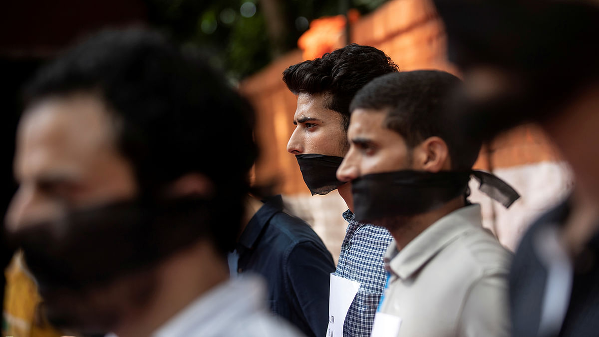 Kashmiri men participate in a protest against the scrapping of the special constitutional status for Kashmir by the government, in New Delhi, India, 9 August, 2019. Photo: Reuters