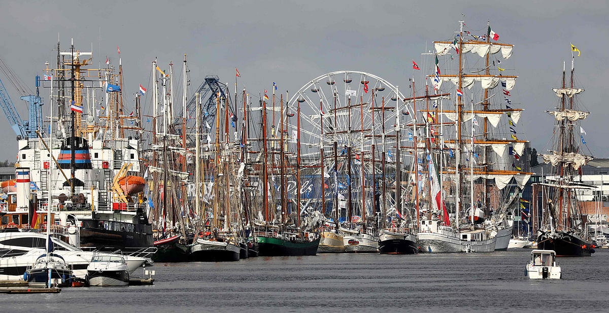 Tall ships wait to take part in sailing events on the second day of the Hanse Sail maritime festival in Rostock, northeastern Germany, on 9 August, 2019. Photo: AFP