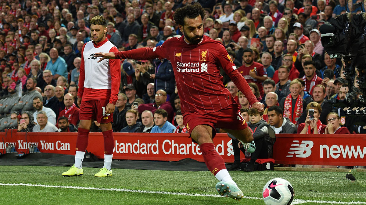 Liverpool`s Egyptian midfielder Mohamed Salah kicks the ball during the English Premier League football match between Liverpool and Norwich City at Anfield in Liverpool, north west England on 9 August 2019. Photo: AFP