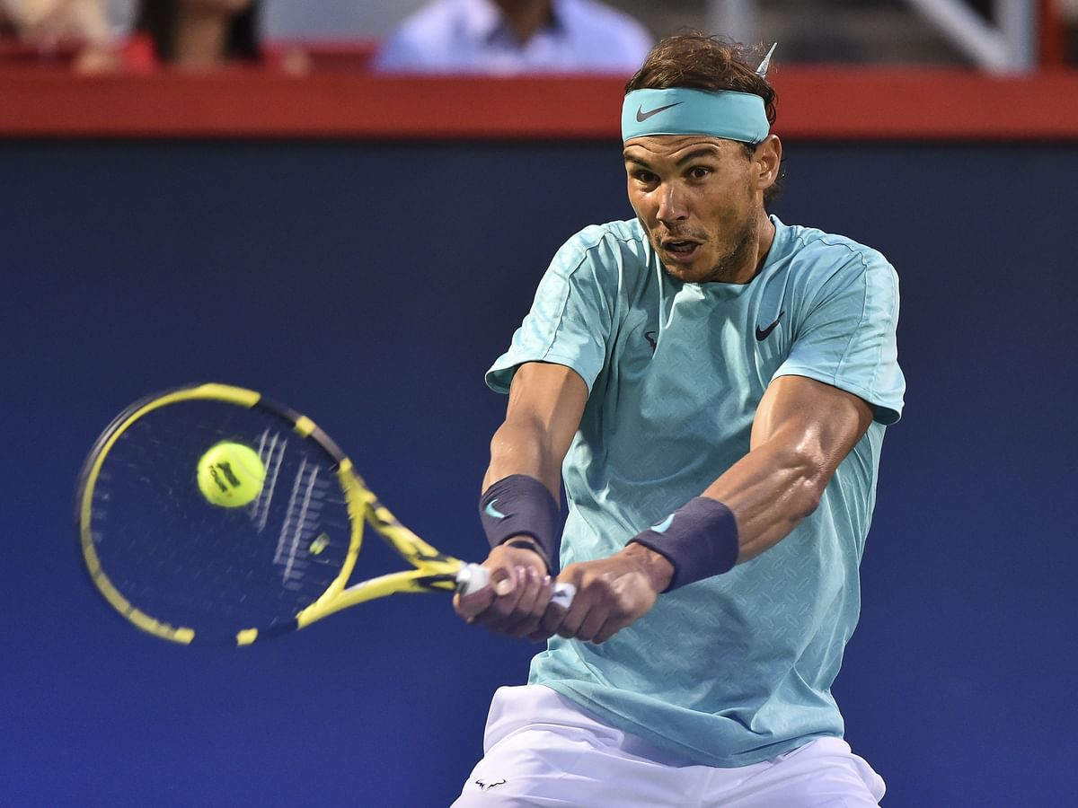 Rafael Nadal of Spain hits the ball against Fabio Fognini of Italy during day 8 of the Rogers Cup at IGA Stadium on 9 August 2019 in Montreal, Quebec, Canada. Photo: AFP