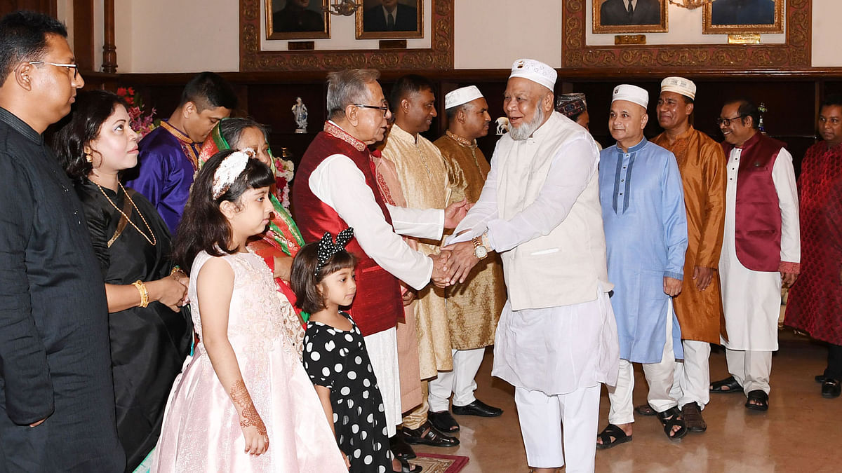 President M Abdul Hamid exchanges greetings with dignitaries at Bangabhaban, Dhaka on the occasion of Eid-ul-Azha on Monday. Photo: PID