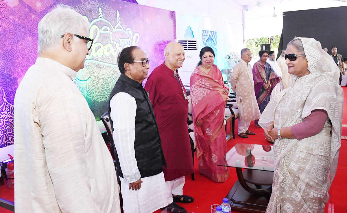 Prime minister Sheikh Hasina exchanges Eid greetings with the leaders of Awami League and her advisers at her official Ganabhaban residence in Dhaka on the occasion of the holy Eid-ul-Azha on Monday. Photo: PID
