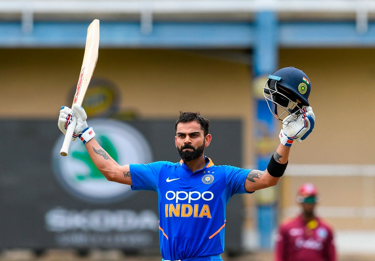 Virat Kohli of India celebrates his century (100 runs) during the 2nd ODI match against West Indies at Queens Park Oval in Port of Spain, Trinidad and Tobago, on 11 August 2019. Photo: AFP