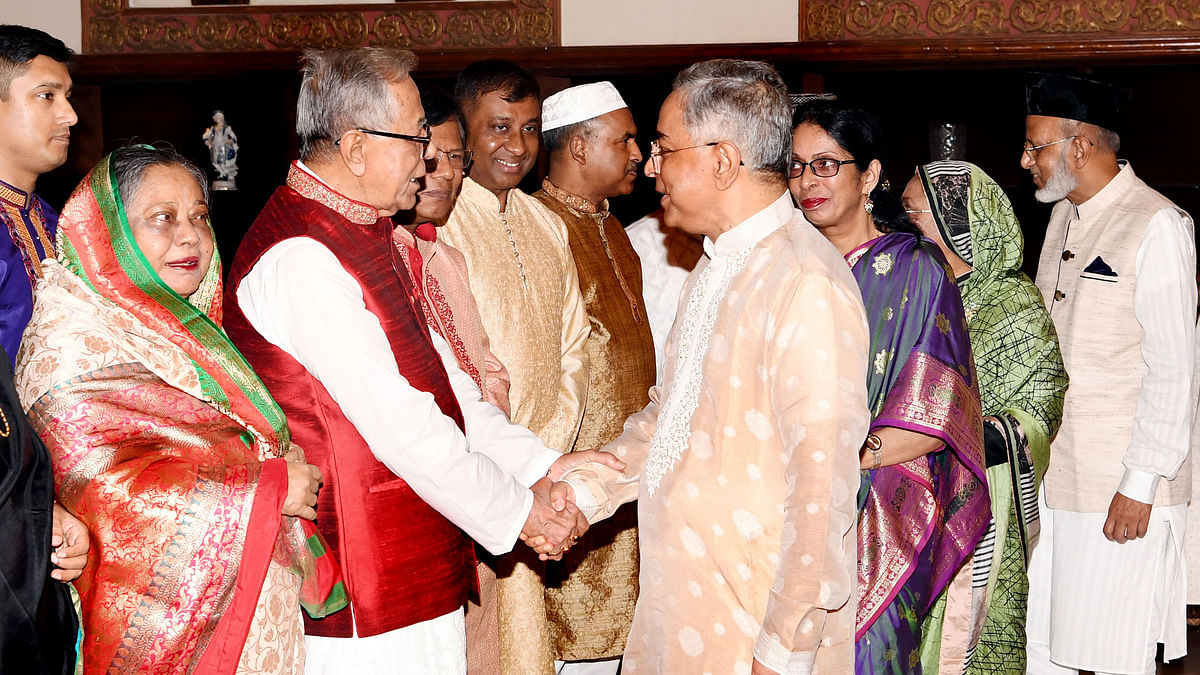 President M Abdul Hamid exchanges greetings with dignitaries at Bangabhaban, Dhaka on the occasion of Eid-ul-Azha on Monday. Photo: PID