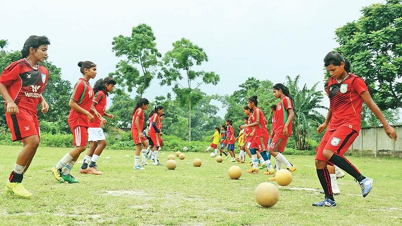 Football girls from Palichora busy in practice. A recent photo by Mainul Islam