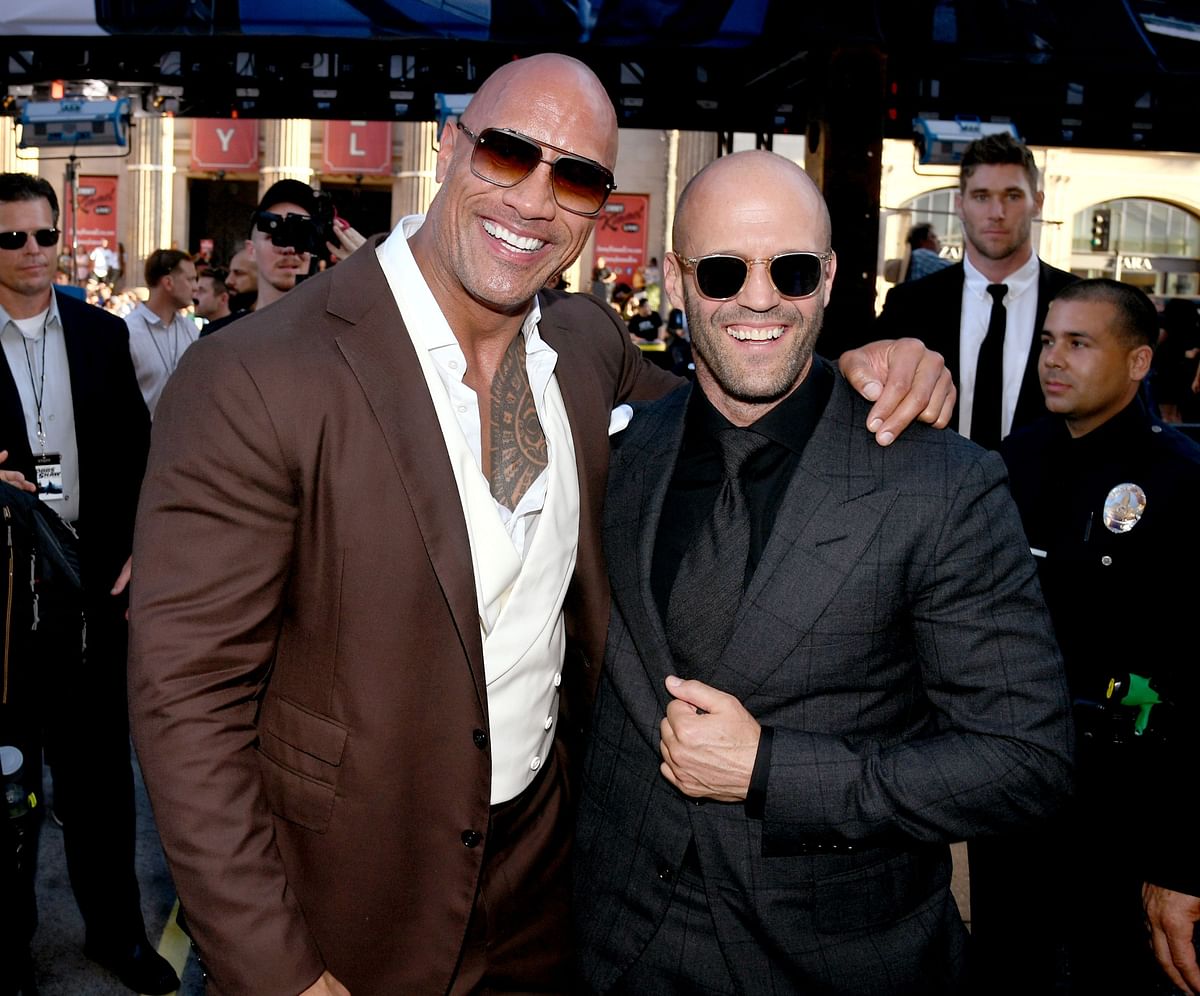 In this file photo taken on 14 July, 2019 Dwayne Johnson (L) and Jason Statham arrive at the premiere of Universal Pictures` `Fast & Furious Presents: Hobbs & Shaw` at Dolby Theatre on 13 July, 2019 in Hollywood, California. Photo: AFP