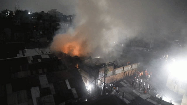 Firefighters trying to extinguish a fire at a plastic factory in Old Dhaka`s Lalbagh on 14 August, 2019. Photo: Dipu Malakar