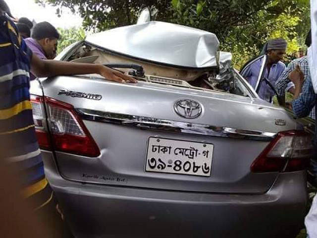 A car crumpled after being hit by a bus at Ramgopalpur in Gauripur upazila of Mymensingh on Friday. Photo: Kamran Parvez