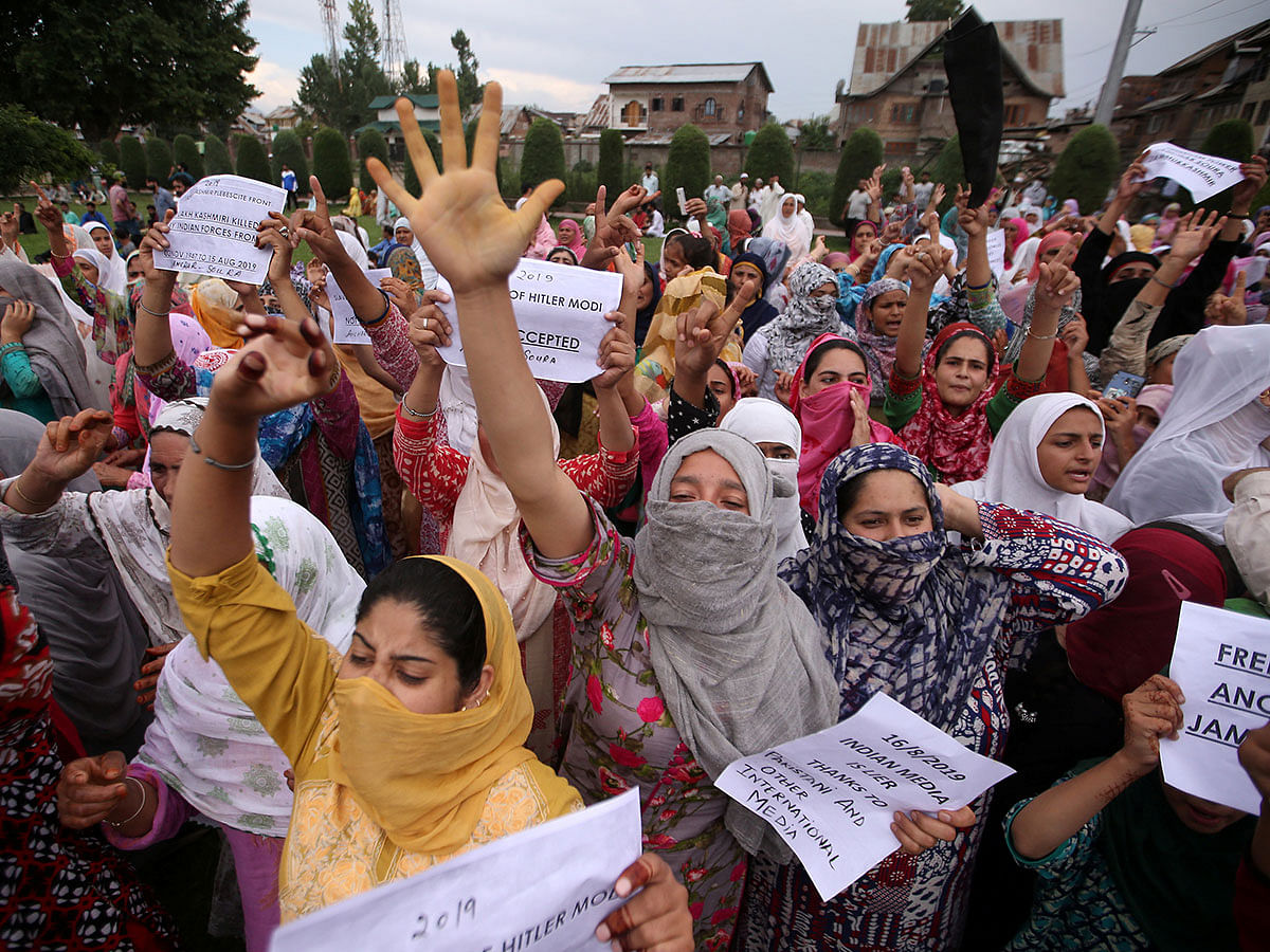 Kashmiri women shout slogans at a protest after Friday prayers during restrictions after the Indian government scrapped the special constitutional status for Kashmir, in Srinagar on 16 August 2019. Photo: Reuters