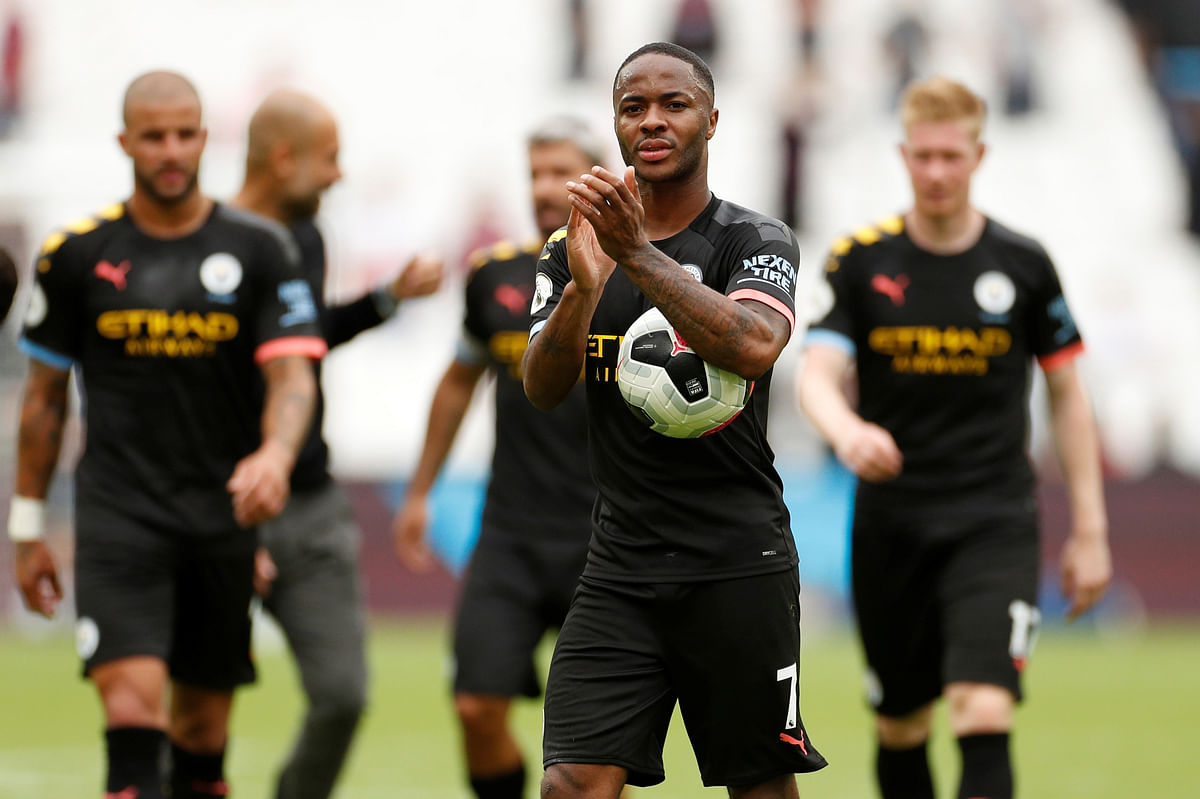 Manchester City`s Raheem Sterling applauds the fans as he holds the match ball after the match against West Ham United. Photo: Reuters