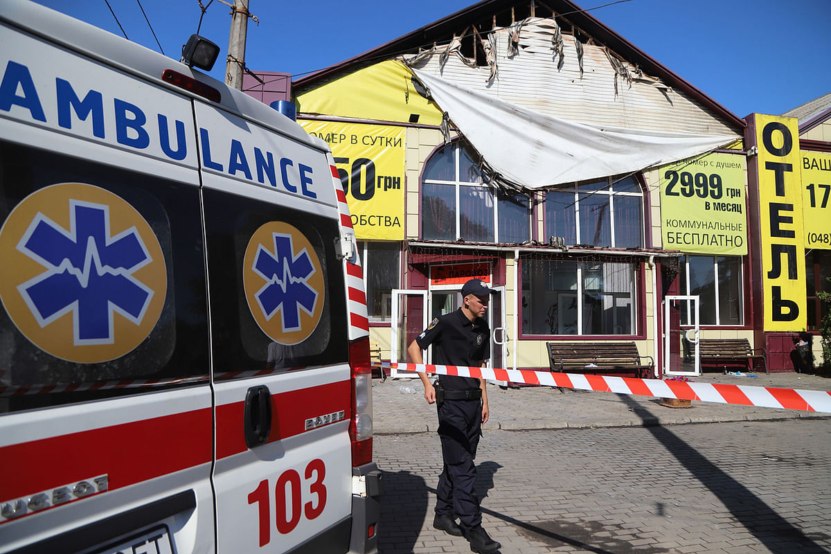 A policeman stays in guard in front of the Tokyo Star hotel in Odessa, southern Ukraine, on 17 August, 2019 after a fire broke out overnight. Photo: AFP