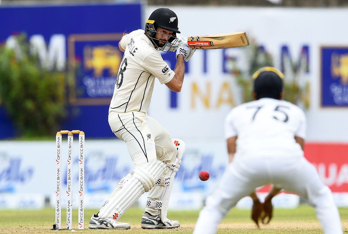 New Zealand’s cricketer William Somerville (L) plays a shot during the fourth day of the opening Test cricket match between Sri Lanka and New Zealand at the Galle International Cricket Stadium in Galle on Saturday. Photo: AFP