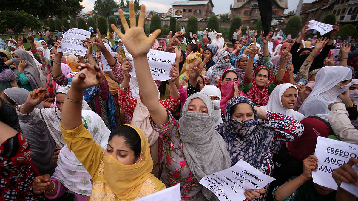 Kashmiri women shout slogans at a protest after Friday prayers during restrictions after the Indian government scrapped the special constitutional status for Kashmir, in Srinagar on 16 August. Photo: Reuters