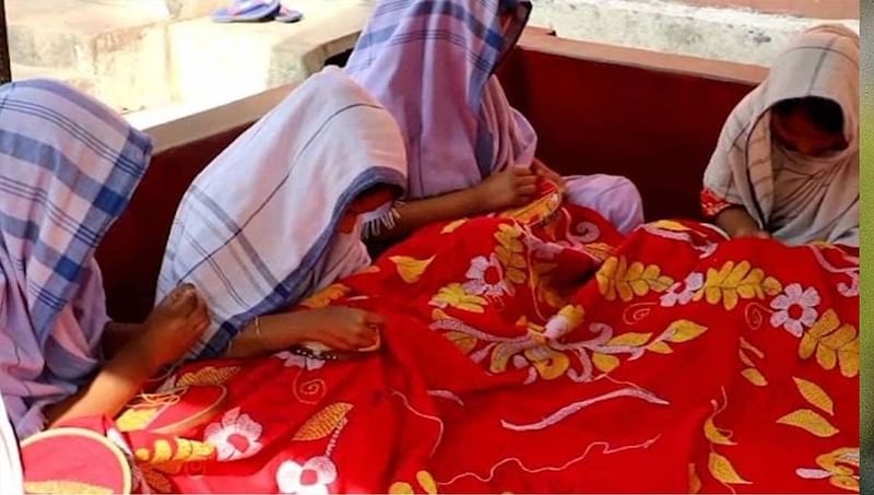 The female inmates of Cumilla Central Jail work on a Nakshi Kantha (handmade embroidered quilt). Photo: UNB