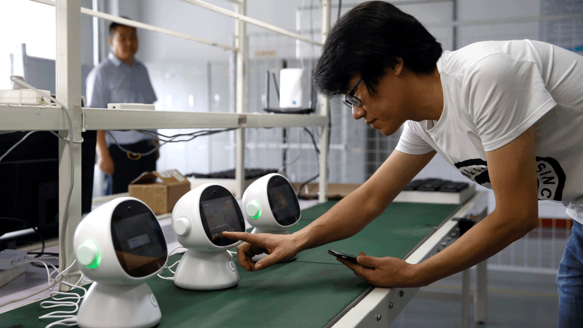 An engineer tests a `Xiaoyi` robot, a Siri-like voice assistant, which links the user to Lanchuang`s intelligent elderly care system, at the headquarters of Lanchuang Network Technology Corp in Weifang, Shandong province, China, 25 July 2019. Picture taken 25 July 2019. Photo: Reuters