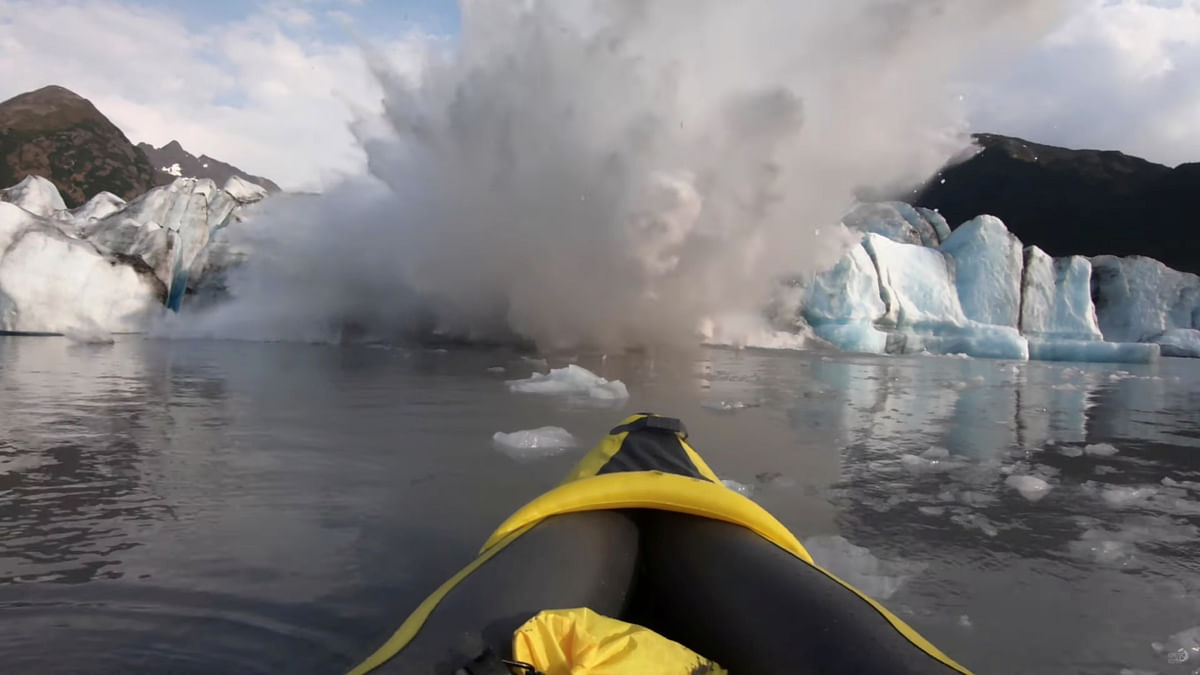 The Spencer Glacier collapses, forming a big wave moments before it crashes into a kayaker, in Alaska, US, on 10 August 2019, in this still image taken from a video obtained from social media. Photo: Reuters